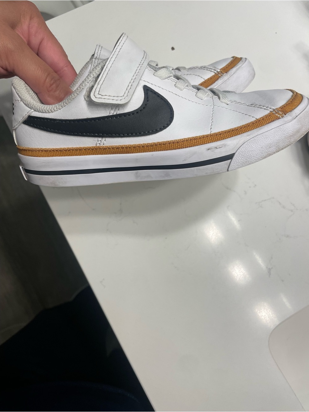 Nike Kids White Sneakers with Black Swoosh and Brown Trim